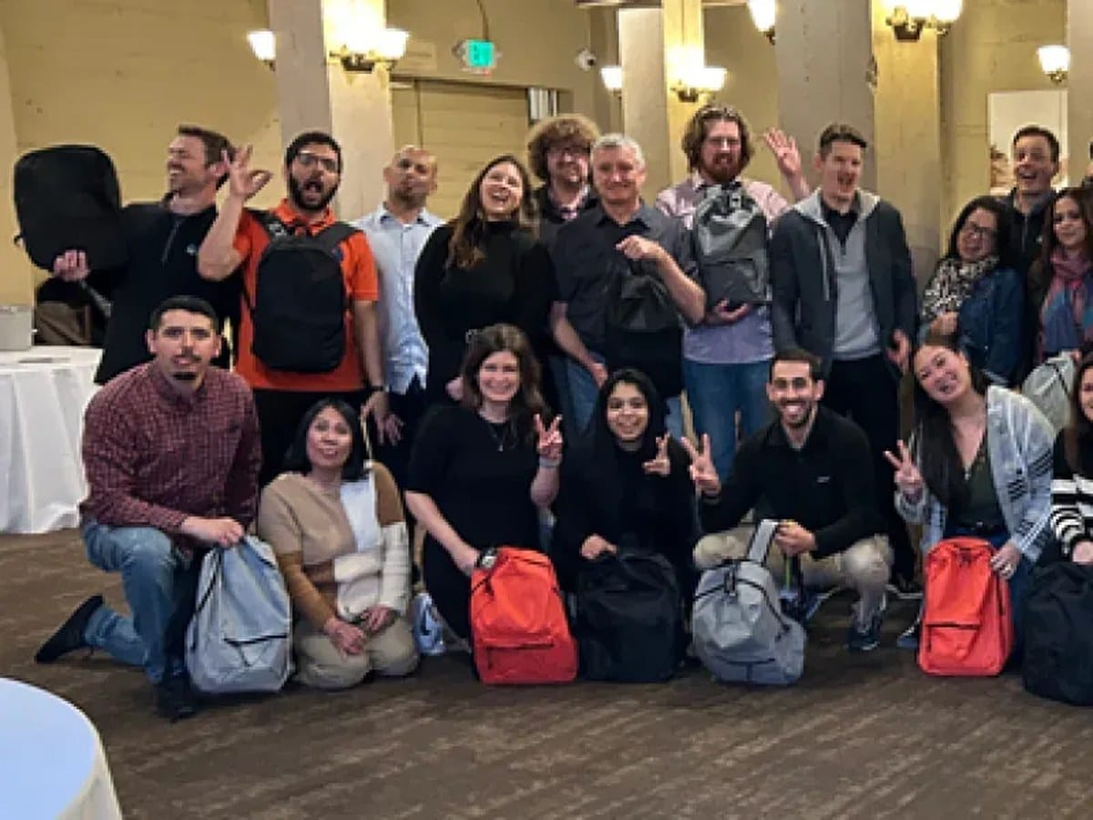 Outdoor team activity at a Bay Area company picnic — bikes and team challenges