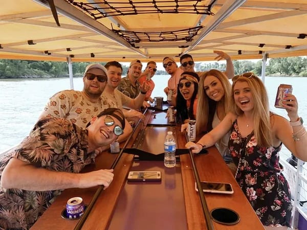 Group on the water at a Bay Area company picnic — Pedal-Powered Boat on Oakland Estuary